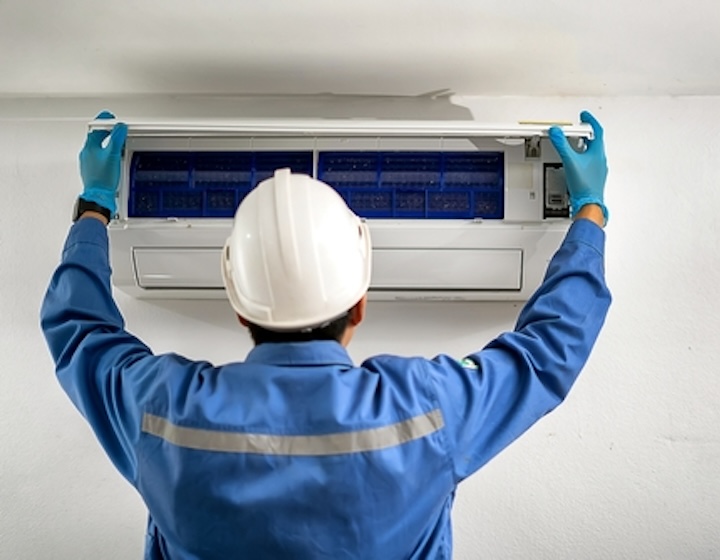 SuperCool Aircon technician at work